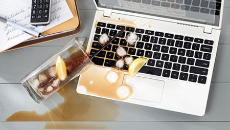 Apple iMac with spilt drink